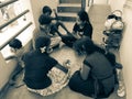 Group of Indian Kids Playing Chowka bhara or Ludo Board Game in Royalty Free Stock Photo