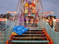 Closeup of beautiful robotic birds and big wheel amusement park near the Kamakshipalya Ground Royalty Free Stock Photo