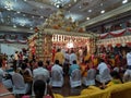 Closeup of beautifully decorated Big Golden Color Wedding Mandapa or Mantapa Design inside the Hindu Marriage Hall