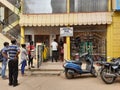 Closeup of group of peoples standing in a queue to take Covid 19 Vaccination free at the Primary Health Centre Rajagopala Nagar