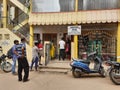 Closeup of group of peoples standing in a queue to take Covid 19 Vaccination free at the Primary Health Centre Rajagopala Nagar