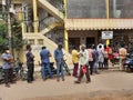 Closeup of group of peoples standing in a queue to take Covid 19 Vaccination free at the Primary Health Centre Rajagopala Nagar