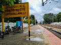 Closeup of Lottegollahalli Railway Station with Yellow and black Color Name Board