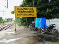 Closeup of Lottegollahalli Railway Station with Yellow and black Color Name Board