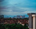 Sunset reflections on Skyscraper or modern apartment Adelia building in Bandar Seri Putra Royalty Free Stock Photo