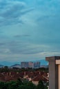 Sunset reflections on Skyscraper or modern apartment Adelia building in Bandar Seri Putra Royalty Free Stock Photo