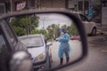 Health worker performing COVID-19 sampling taken from individuals by drive thru at the Quick Test