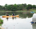 Women kayaking in the Taman Tasik Cempaka lake in the morning