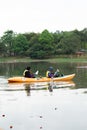 Women kayaking in the Taman Tasik Cempaka lake in the morning