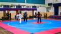 Two women athletes competes during the `Sukan Kombat 6 Penjuru` competition or fighting combat games.