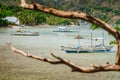 Bangka fishing boats on shore in low tide near El Nido village, Palawan, Philippines Royalty Free Stock Photo