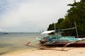 A bangka, the traditional filipino boat, moored in Tulubhan beach. Boracay Island. Western Visayas. Philippines Royalty Free Stock Photo