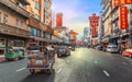 Bangkok China Town or Yaowarat road in evening sunset with Tuk T