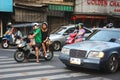 Bangkok Chinatown. Traffic. Young Thai family. Thai child Royalty Free Stock Photo