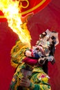 Bangkok Chinese New Year, Chinese Opera actor perform spitting fire in the traditional face-changing. Royalty Free Stock Photo