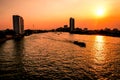 Bangkok City - Aerial view Chao Phraya River Bangkok city urban downtown skyline of Thailand at sunset .silhouette background