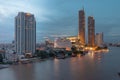 Bangkok Cityscape Business Administrative center with river view during sunset. Royalty Free Stock Photo