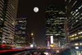 Bangkok cityscape night with train motion light in city Thailand