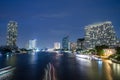 Bangkok cityscape with river and boat at night time Royalty Free Stock Photo