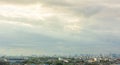 Bangkok cityscape with sky and clouds.