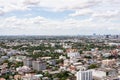 The Bangkok cityscape from skyscraper view with clouds and blue sky