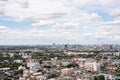 The Bangkok cityscape from skyscraper view with clouds and blue sky