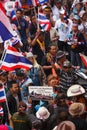 BANGKOK-DEC 22: Unidentified Thai protesters raise banners to re