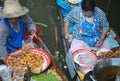 Women cooking and selling food at the Bangkok Floating Market, Thailand, Asia