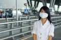 At bangkok intl airport with face mask Royalty Free Stock Photo