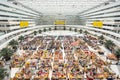 Bangkok: the main hall of Chaeng Watthana Government Complex occupied by a food and clothing market