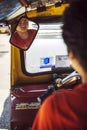 BANGKOK - JUNE 10, 2015: An unidentified tuktuk driver stuck in