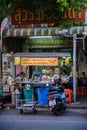 Bangkok Ratchawat Thailand people preparing Thai street food at a food stall with a wok pan stir fry
