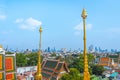 Bangkok skyline: golden spires of Lokha Prasat and downtown