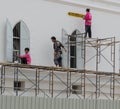 Bangkok, Tahiland - 2019-03-01 - Crew paints a balcony for restoration of Grand Palace Royalty Free Stock Photo