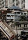 Comparison of living and Architecture design in Difference large cities. Overlapping architectural of Old wooden house, Shophouse