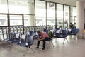 Bangkok, Thailand April 15, 2020 : asian man sitting at social distancing seats in bangkok airport