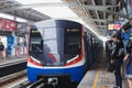 BANGKOK THAILAND - APRIL 06, 2021: At BTS Skytrain station. The Bangkok Mass Transit System, people passengers in rush hour.