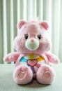 Bangkok, Thailand - April 2, 2024 : Cute a pink Care Bears. Teddy bear dolls Care Bears