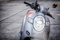 BANGKOK, THAILAND - APRIL 03, 2019: LED Headlights Turned on a 2019 Honda Scoopy i Club 12 Motor Scooter Royalty Free Stock Photo