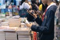 Bangkok, Thailand - April 6, 2019 : People choose books at Bangkok International Book Fair at Queen Sirikit National Convention Royalty Free Stock Photo