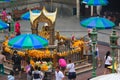 Bangkok, Thailand - April 31, 2014. People praying at an altar of worship to Phra Phrom , God of the Manifested World in the city