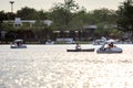 People ride duck boat at public park name Suan Luang Rama IX on sunset time Bangkok, Thailan