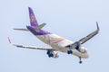 Plane or Aircraft of Thai Smile Airways or Airlines on the sky landing to Suvanabhumi airpor