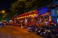 The pleasant outdoor night restaurant on Rambuttri Alley in the heart of tourist night life in Bangkok, Thailand