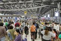 Bangkok, Thailand - April 10, 2023: Suvarnabhumi Airport with many travelers during the Songkran Festival because it is the Thai