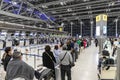 Bangkok, Thailand - April 10, 2023: Suvarnabhumi Airport with many travelers during the Songkran Festival because it is the Thai