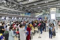 Bangkok, Thailand - April 10, 2023: Suvarnabhumi Airport with many travelers during the Songkran Festival because it is the Thai