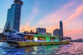 The tourist on Chao Praya river dinner cruise with beautiful sunset sky