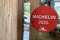 View of Michelin Star Guide 2020 Sticker on Restaurant Wall Royalty Free Stock Photo