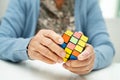 Bangkok, Thailand August 14, 2023 Alzheimer disease AD, Asian elderly woman patient playing Rubik cube game to practice brain